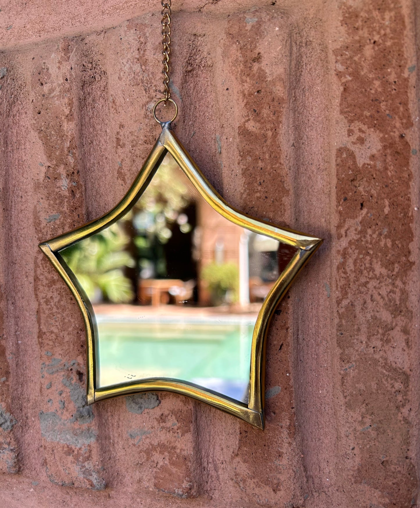 Handmade brass mirror on a chain drop eye or star