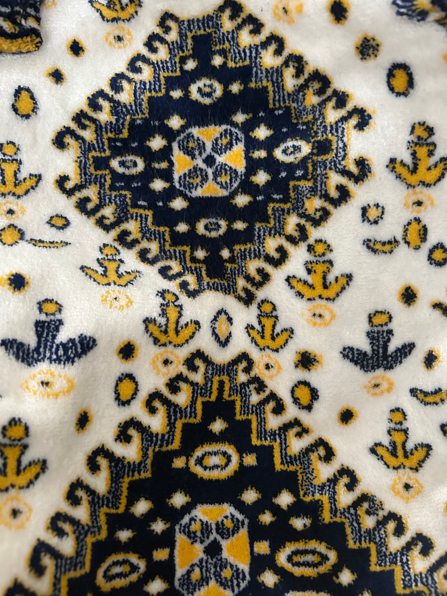 Tas van tapijtstof met rits blauw wit