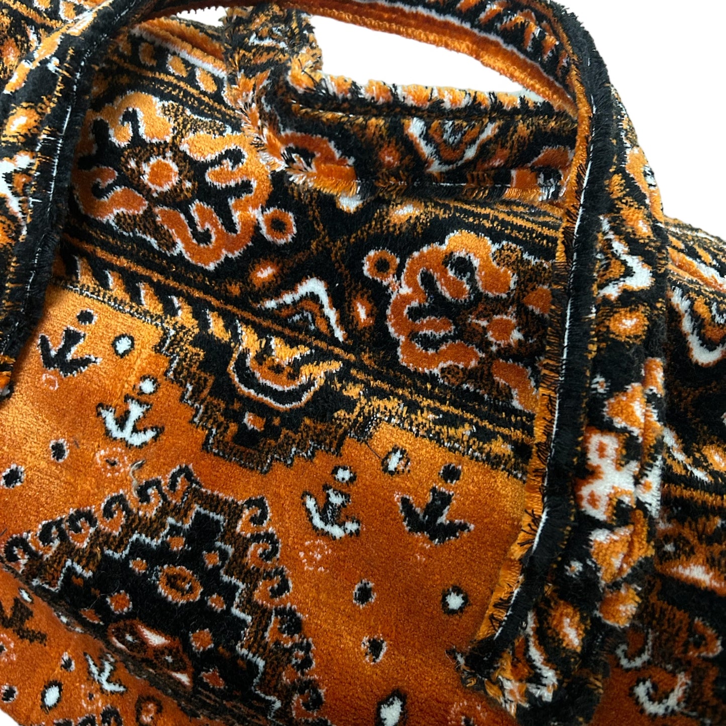 Weekend bag made of carpet fabric in golden yellow color with black