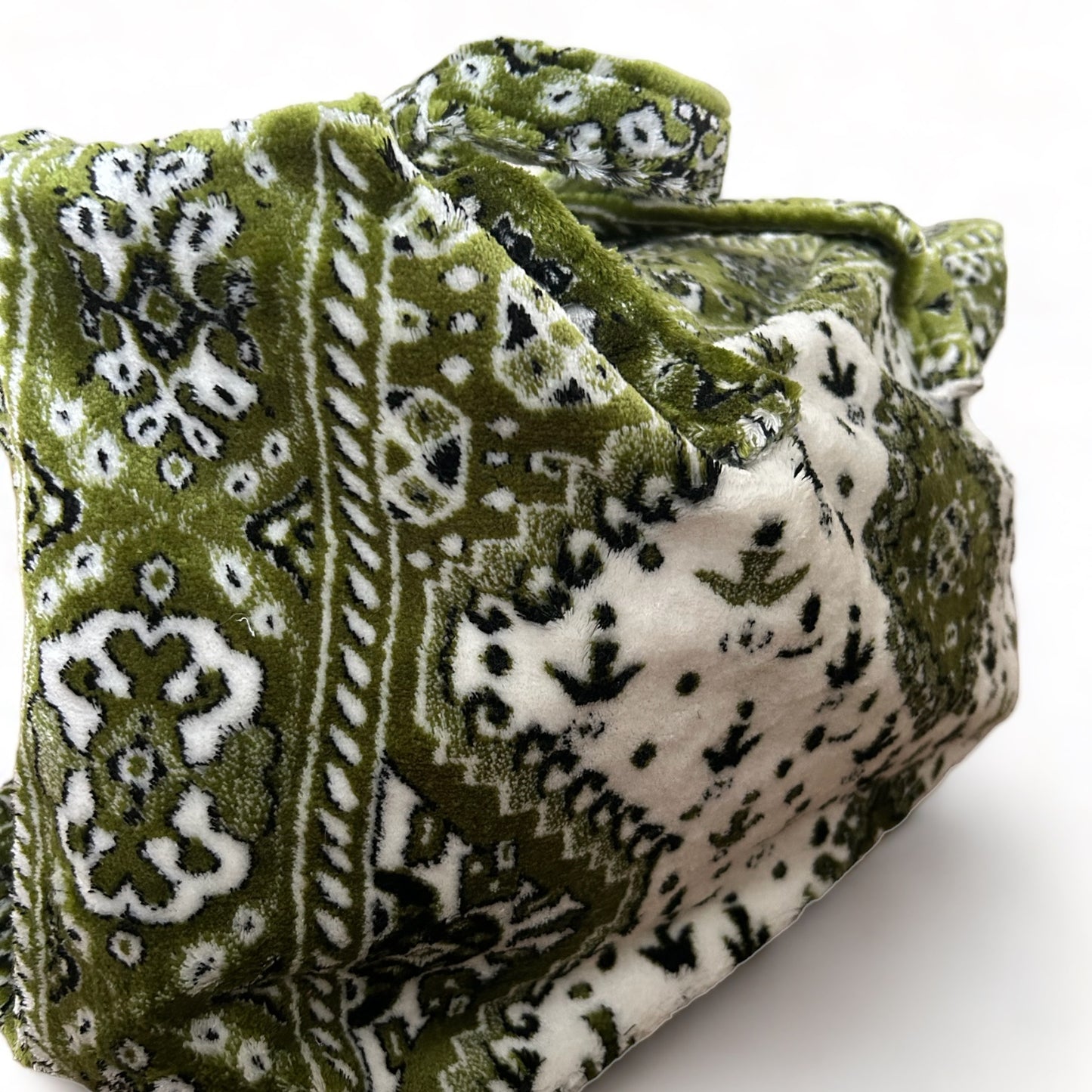 Weekend bag made of carpet fabric in olive green color with white
