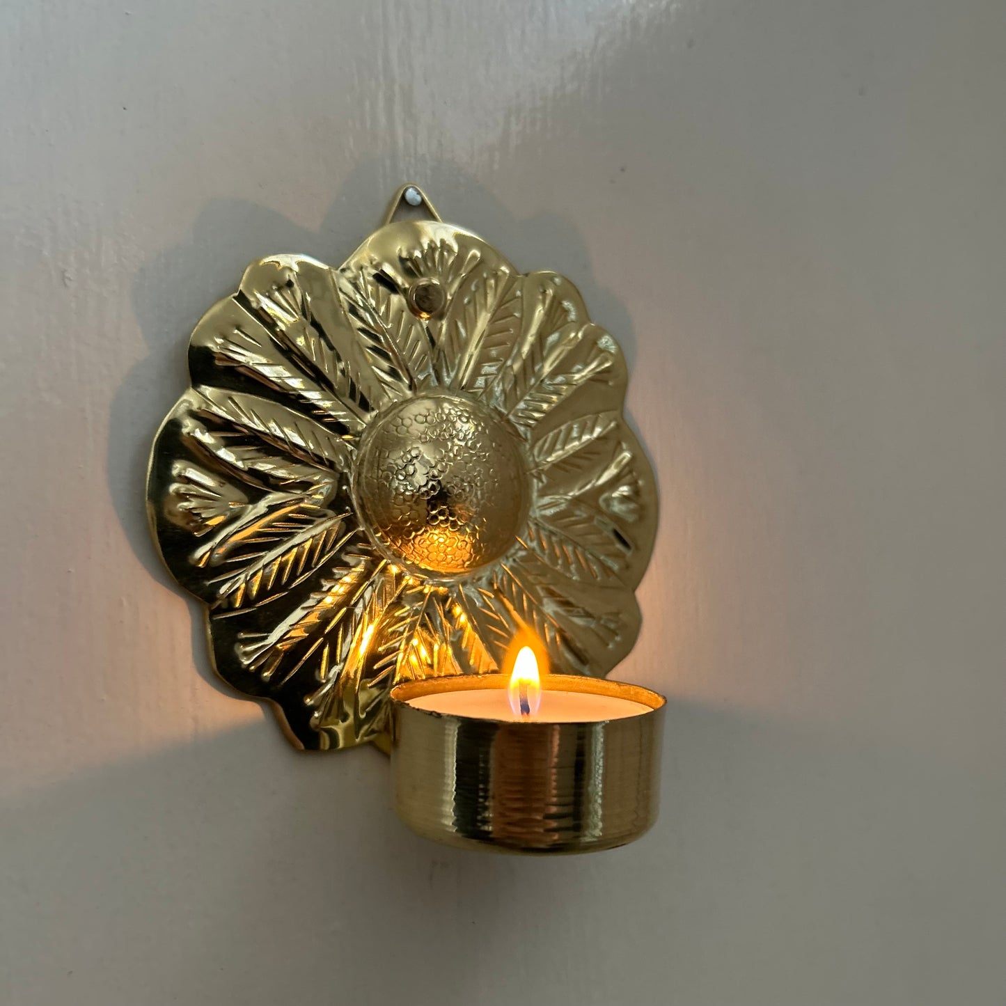 Brass tea light holder for the wall Daisy
