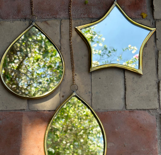 Handmade brass mirror on a chain drop eye or star