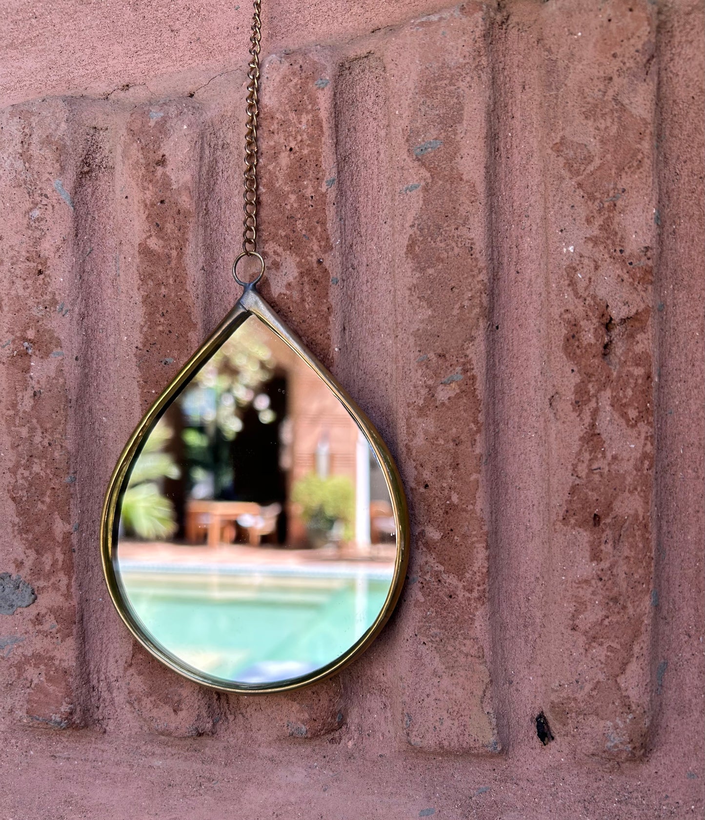 Handmade brass mirror on a chain drop eye or star