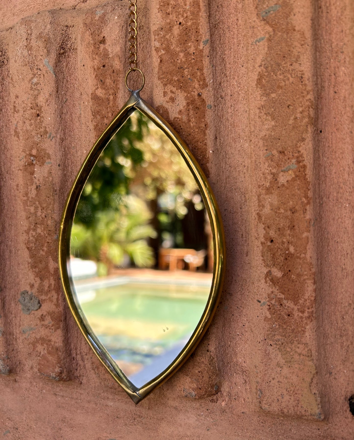 Handmade brass mirror on a chain drop eye or star