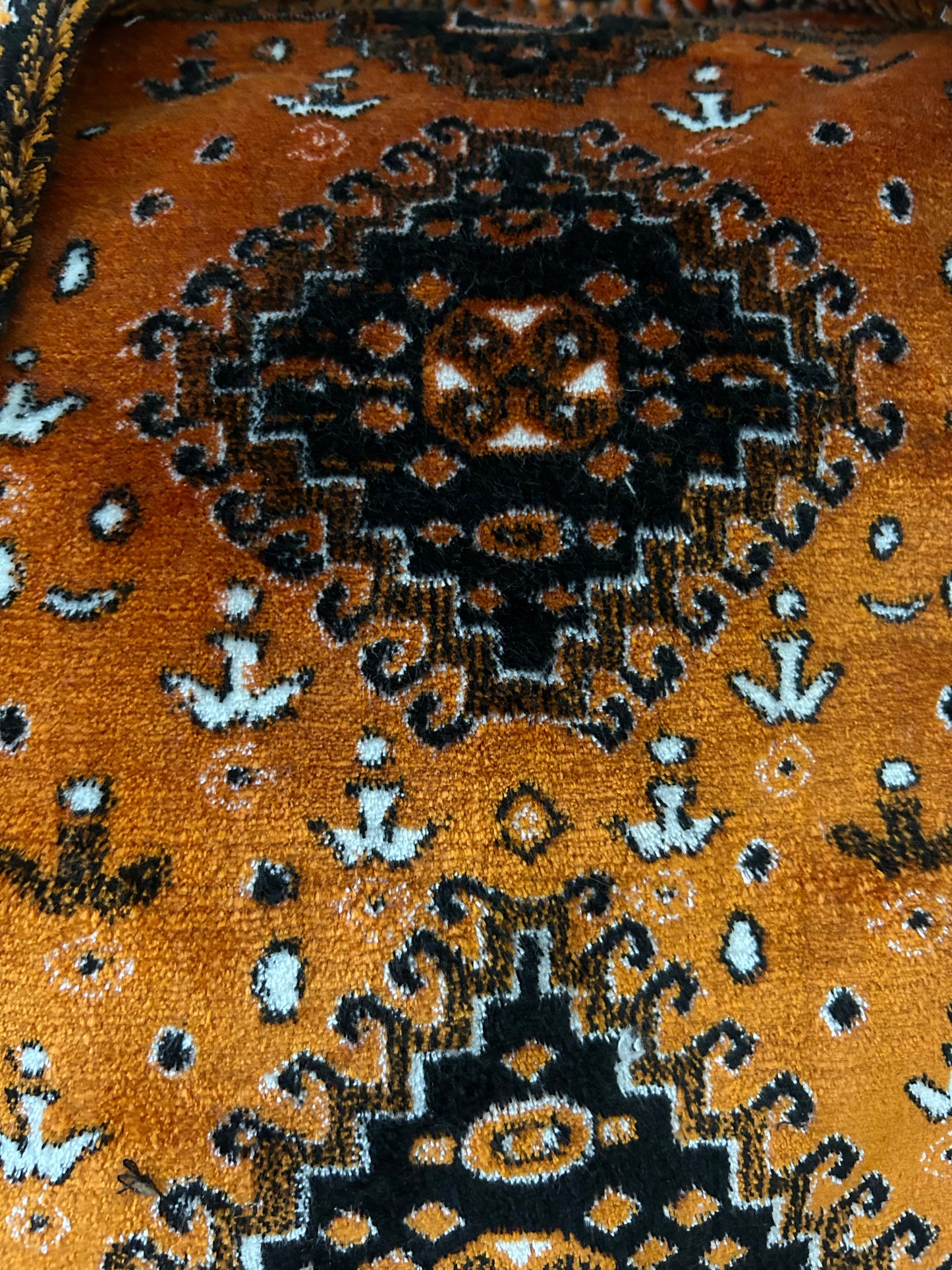 Weekend bag made of carpet fabric in golden yellow color with black