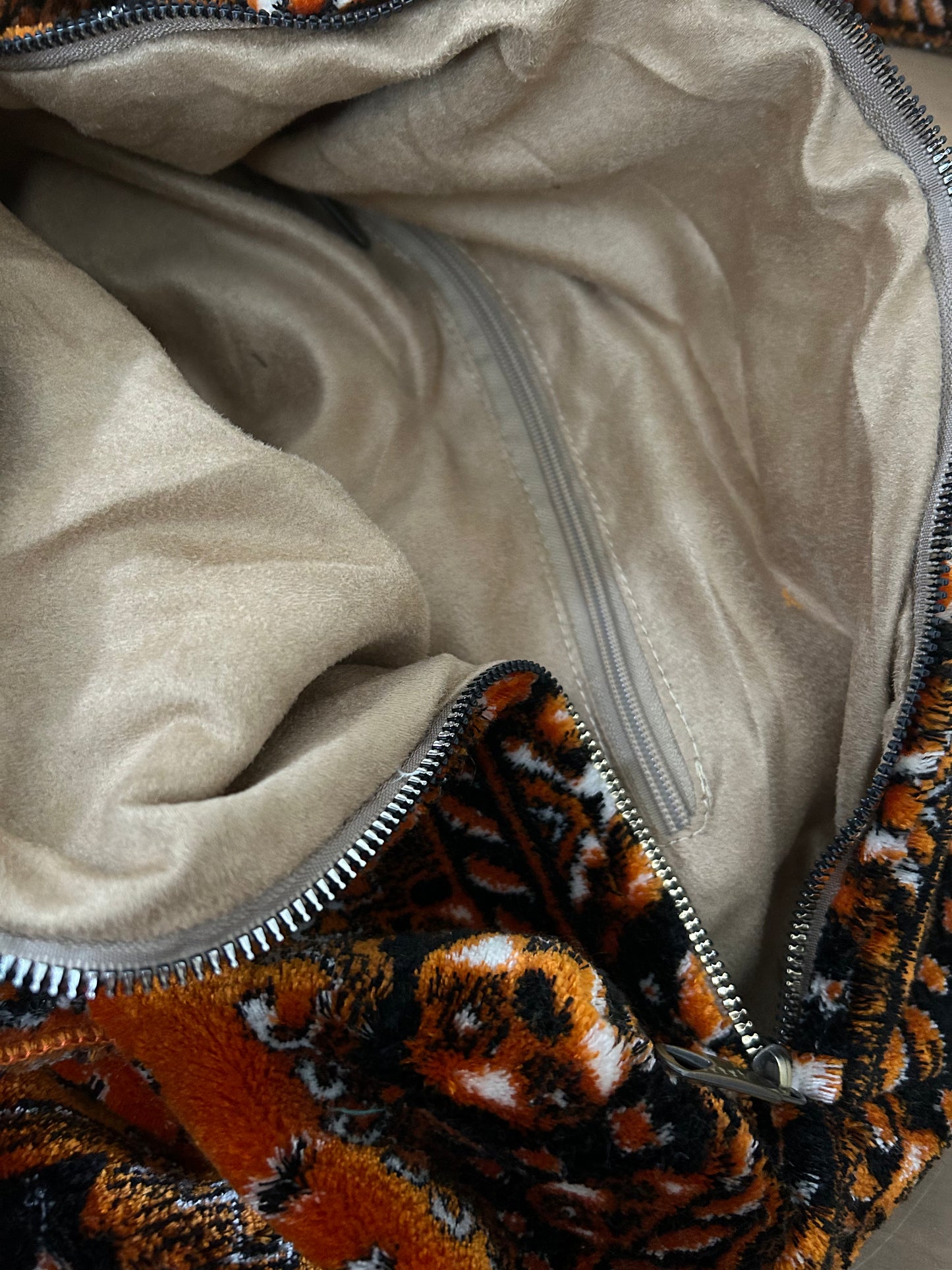 Weekend bag made of carpet fabric in golden yellow color with black