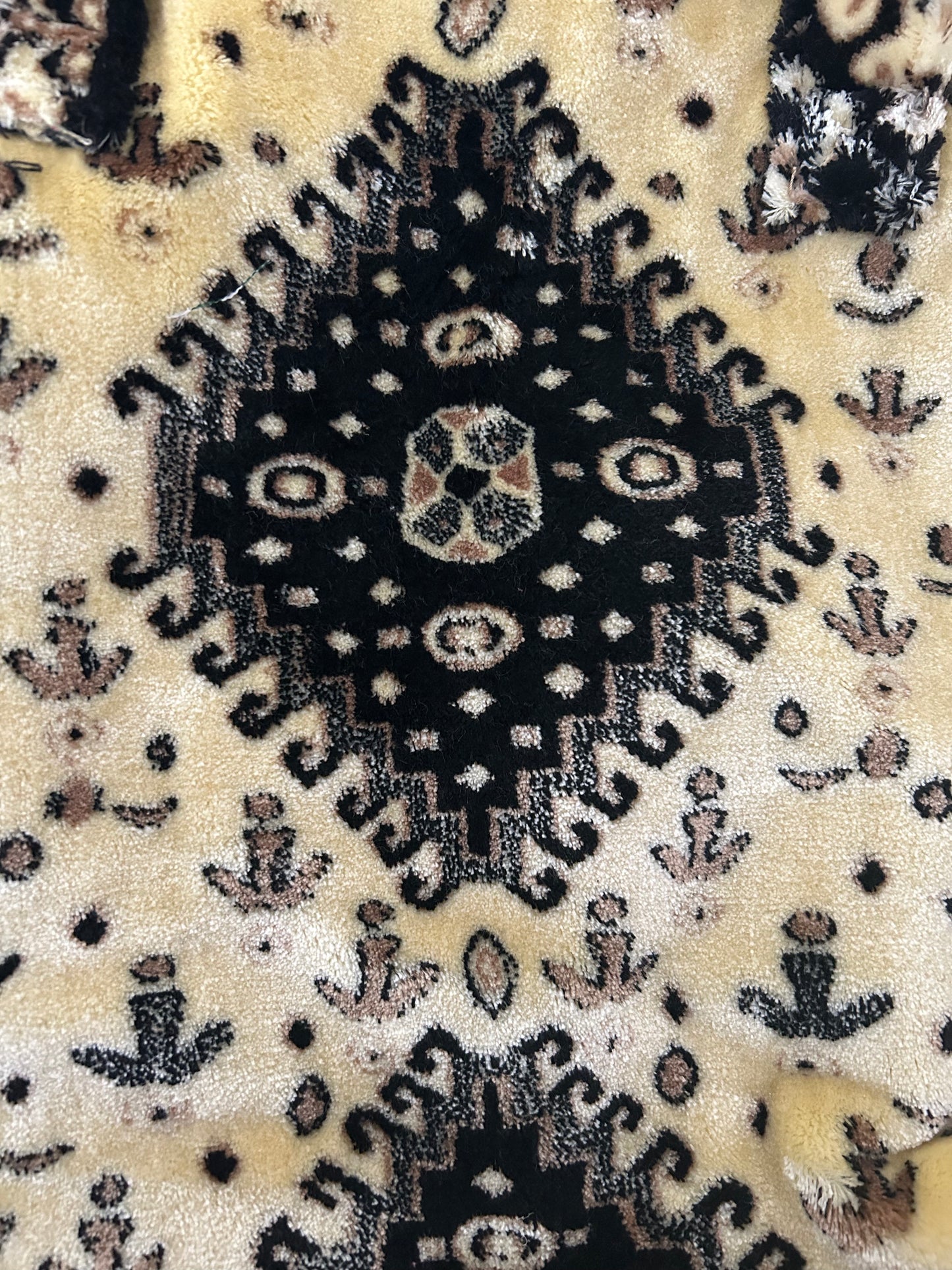 Tas van tapijtstof met rits zwart beige