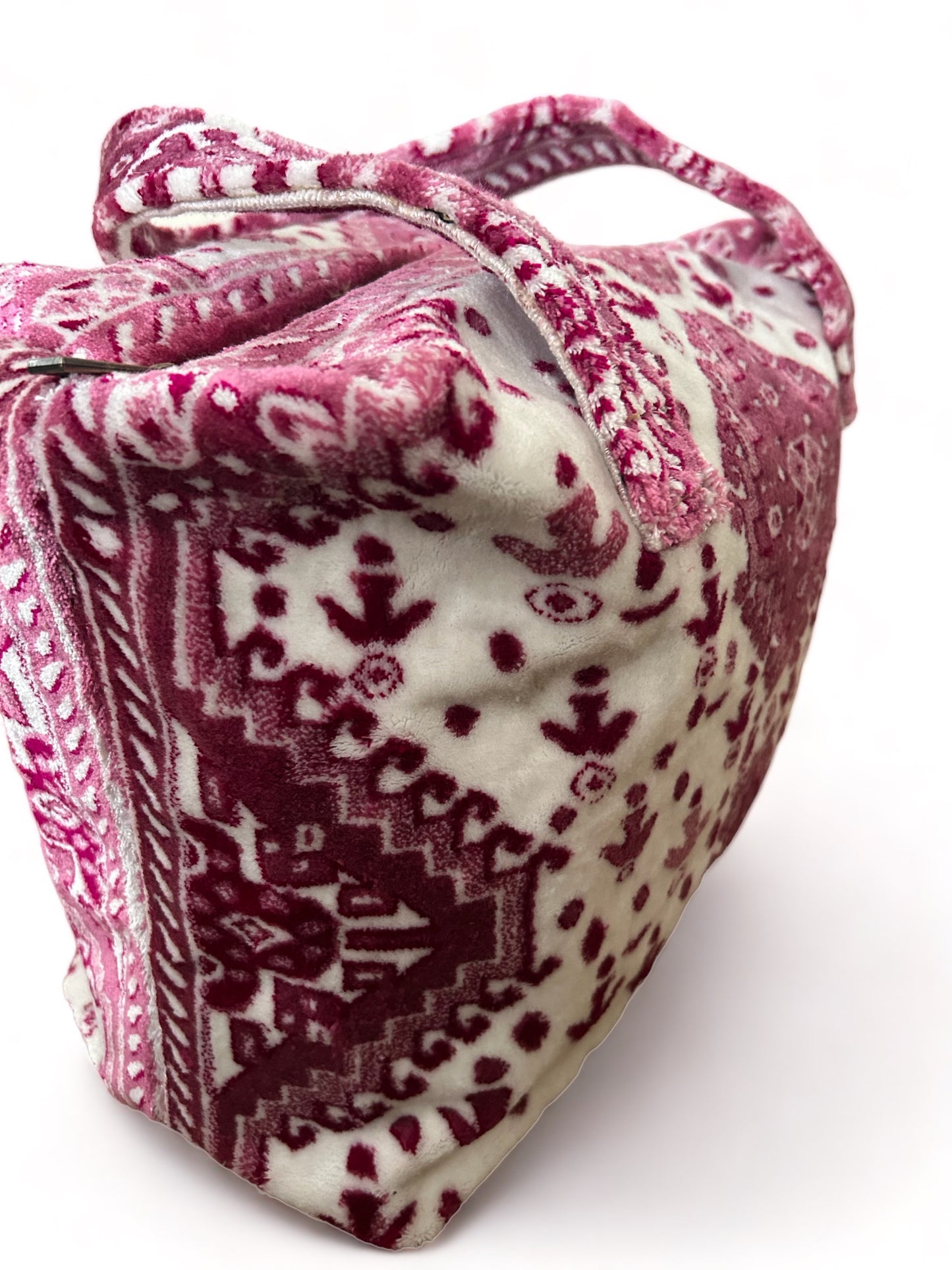 Tas van tapijtstof met rits roze